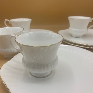 Staffordshire England bone China crown tea cups with desert plates
