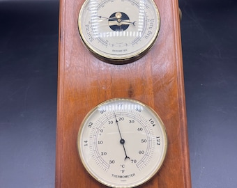 Vintage wooden wether instrument, measuring the temperature in F and Celsius and barometer, made in France