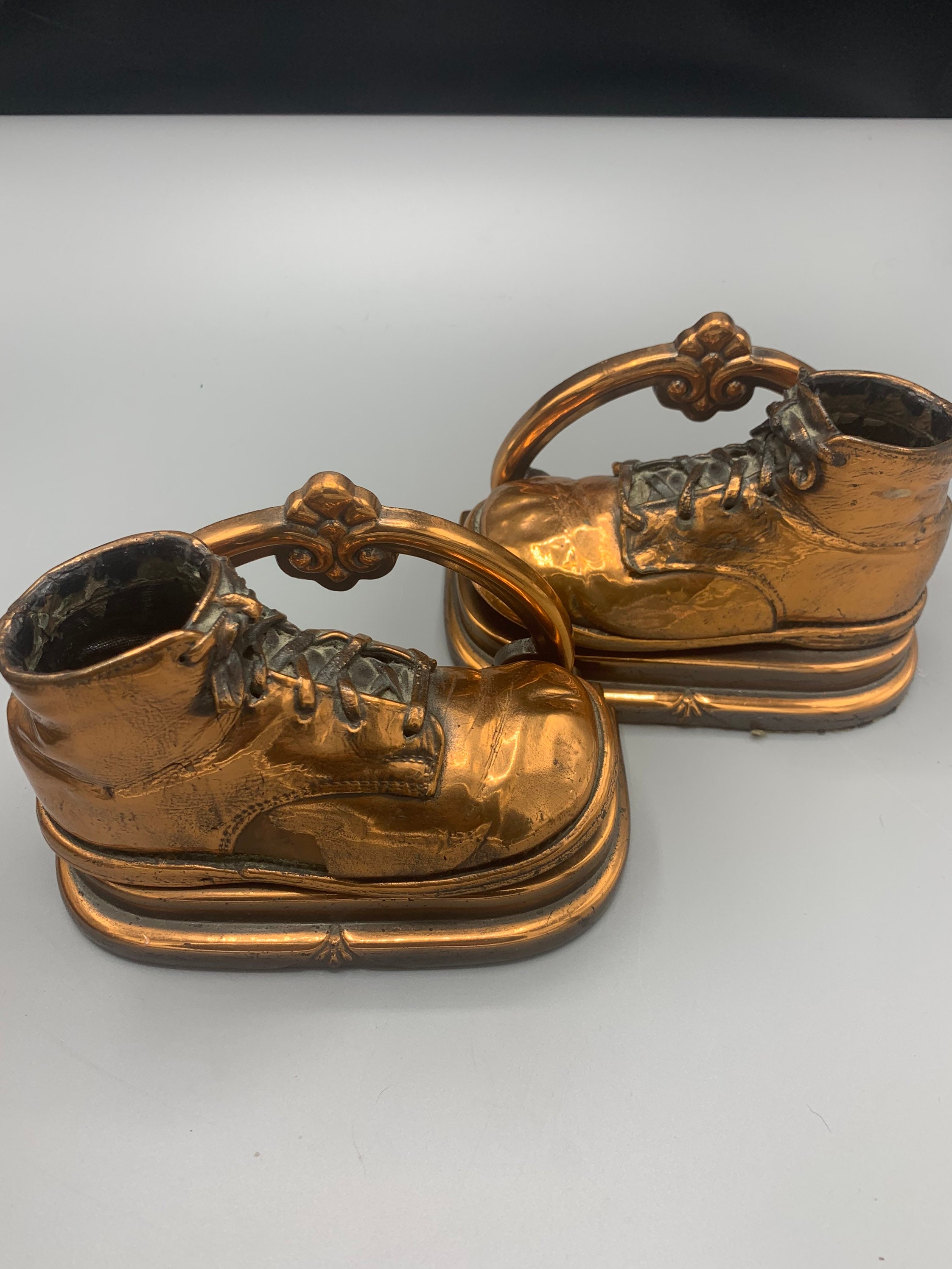 Bronze baby shoe bookends deals