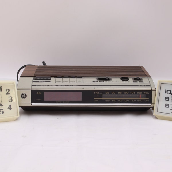 Vintage radio alarm clock and two electric clocks