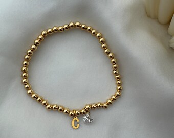 Bracelet personnalisable avec pendentif lettre or et coeur zircone