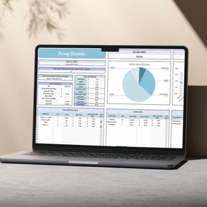 May include: A laptop displaying a pricing calculator spreadsheet. The screen shows data fields for product name, costs, and selling price. A pie chart illustrates price breakdown. The text "Pricing Calculator" is at the top.
