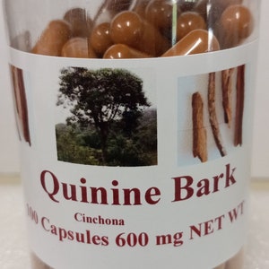 May include: A clear plastic bottle filled with brown capsules. The label reads "Quinine Bark Cinchona 100 Capsules 600 mg NET WT".