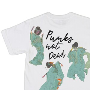 May include: White t-shirt with a graphic of three women in traditional Japanese clothing. The text "Punks not Dead" is printed on the back of the shirt.