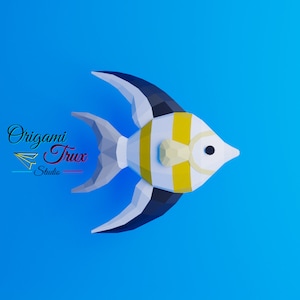 Könnte beinhalten: Ein weißer, gelber und schwarzer Origami-Fisch mit dreieckiger Form. Der Fisch hat ein schwarzes Auge und einen gelben Streifen um seinen Körper.
