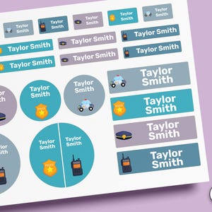 May include: A sheet of rectangular and circular adhesive labels in shades of blue and purple. Each label features the name Taylor Smith in white text, accompanied by police-themed icons including a badge, a police car, a hat, and a radio.