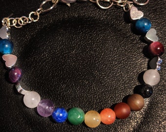 Pulseira de pedras preciosas do orgulho arco-íris