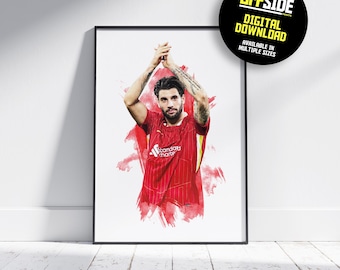 May include: Framed art print featuring a soccer player in a red jersey with the "Standard Chartered" logo. The player is depicted with arms raised, set against a red watercolor splash. A black circle with the text "OFFSIDE PRINTS DIGITAL DOWNLOAD AVAILABLE IN MULTIPLE SIZES" is in the upper right corner.