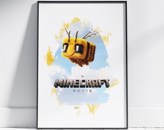 May include: Framed poster featuring a Minecraft bee character against a blue and yellow watercolor background. The text "A Minecraft Movie" is displayed in a pixelated font, adding to the game's aesthetic. The poster is in a black frame.