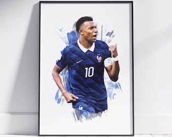 May include: A framed art print featuring a soccer player wearing a dark blue jersey with the number 10, a white collar, and a French national team crest. The player has a white armband on one arm and is shown against a blue watercolor splash.