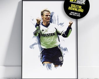 May include: Framed print featuring a soccer player in a white and navy uniform with the word "Holsten" on the front. The player is celebrating with arms raised. A black circle with yellow text that reads "OFFSIDE PRINTS DIGITAL DOWNLOAD AVAILABLE IN MULTIPLE SIZES" is in the upper right corner.