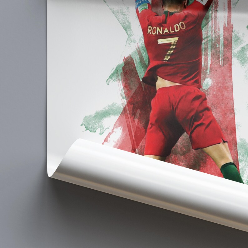 May include: A watercolor-style illustration of a soccer player in a red and green jersey with the word "RONALDO" and the number "7" on the back. The player is in mid-air, kicking a soccer ball.