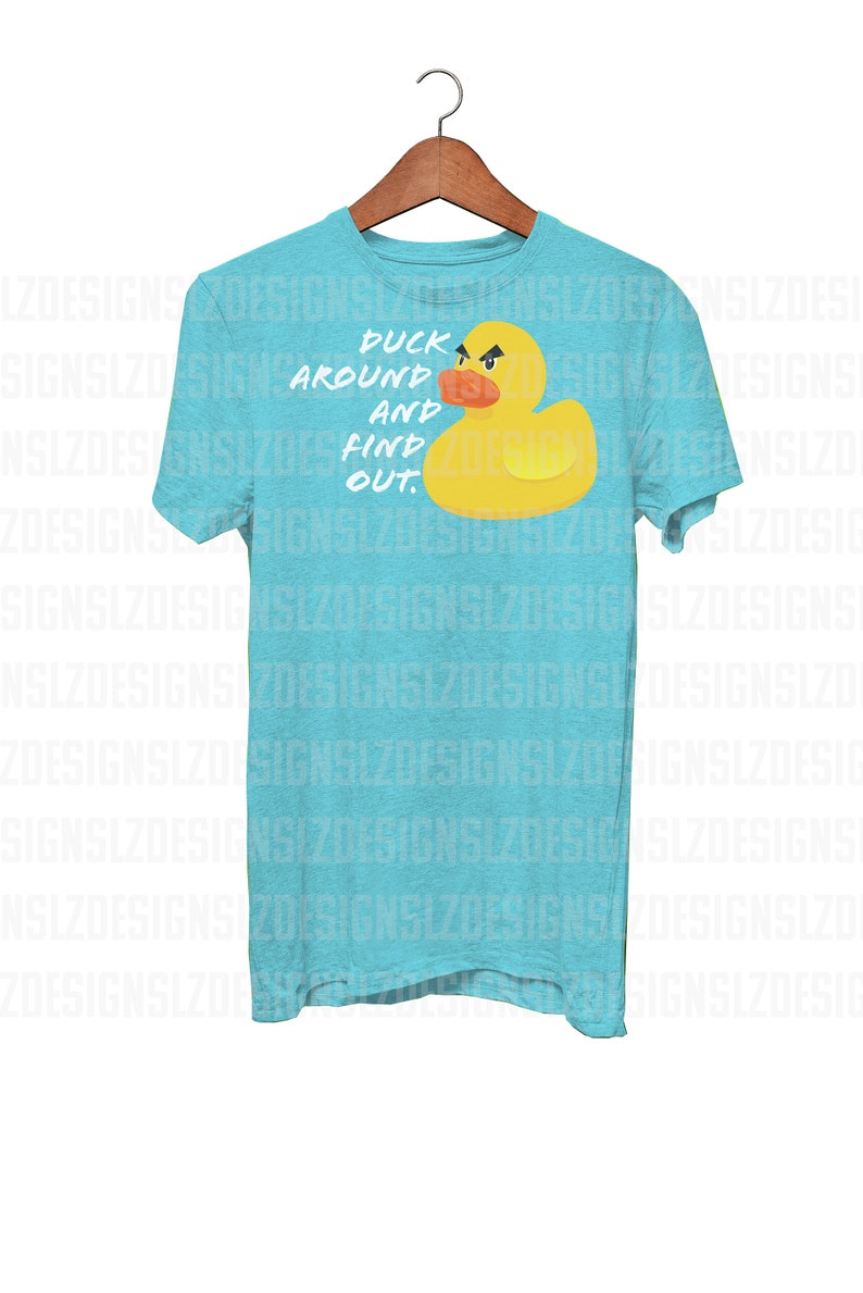 May include: A turquoise blue t-shirt with a yellow rubber duck and the text "Duck around and find out."