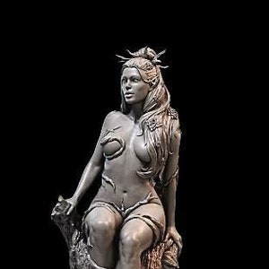 May include: A gray sculpted figure of a woman with long hair and a crown of leaves, sitting on a tree stump. The figure is nude and has vines and leaves growing around her body.