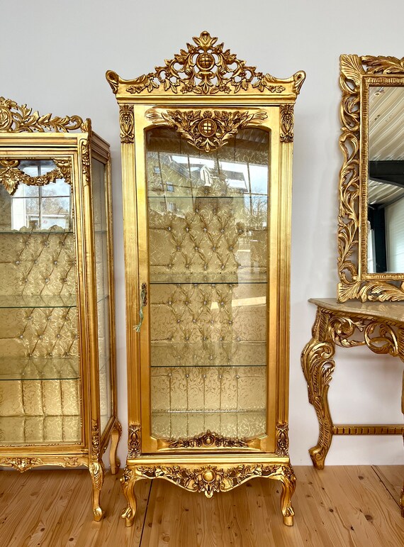 Antique gold curio cabinet discount