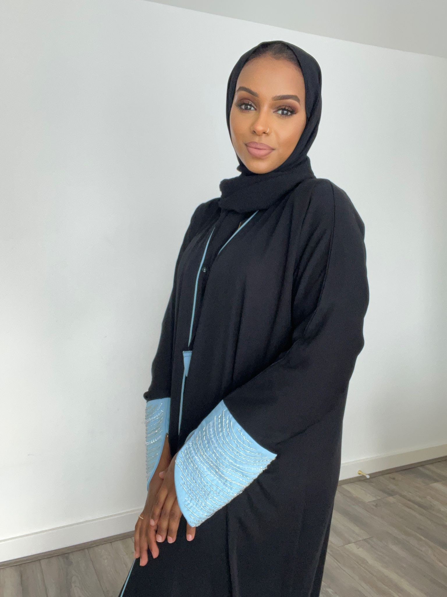 white and black abaya