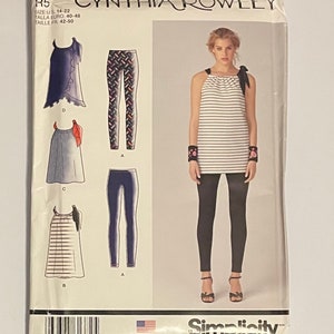 May include: A sewing pattern for a women's top and leggings. The pattern is by Cynthia Rowley and is for sizes 14-22. The pattern includes instructions for making a striped top with a tie detail and a pair of leggings. The pattern is designed and printed in the USA.