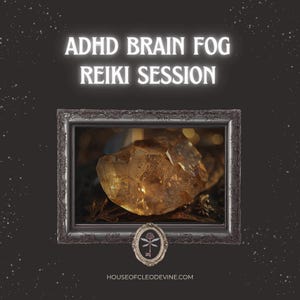 May include: A framed image with the text "ADHD BRAIN FOG REIKI SESSION." The image inside the frame features a large, amber-colored crystal. The frame is dark gray, and the background is a dark gray with white star-like specks.