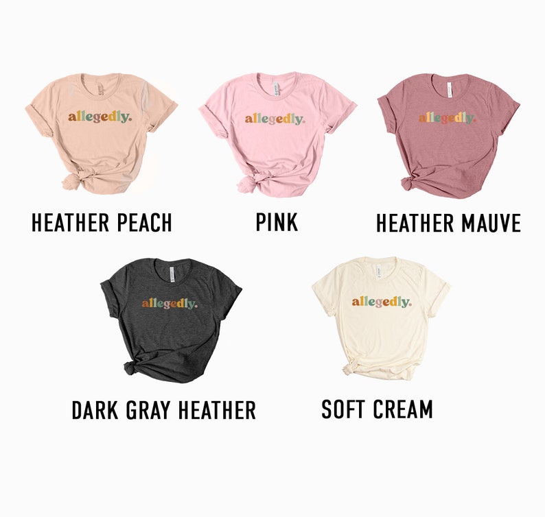a group of different colored shirts with words on them