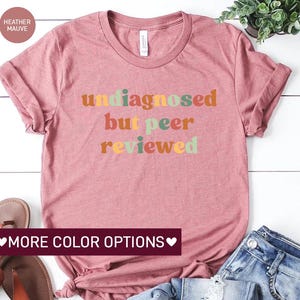 a t - shirt with the words untagged but peer reviewed on it
