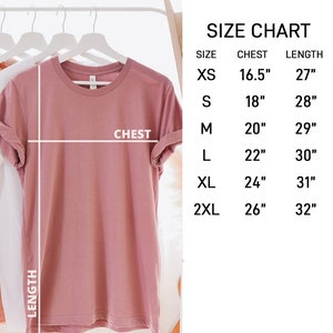 May include: Size chart for a t-shirt with measurements in inches for chest and length. Sizes include XS, S, M, L, XL, and 2XL.