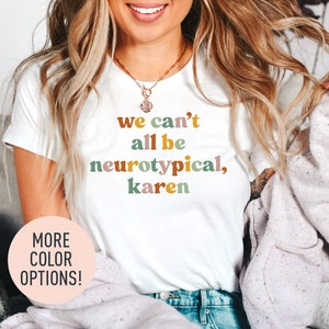 a woman wearing a t - shirt that says we can't all be ne