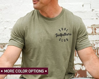 May include: A green t-shirt with the text "COOL Godfathers CLUB" in black lettering.