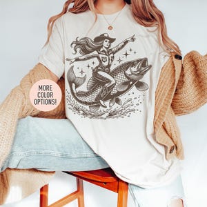 Shirt cowgirl rijdt op een vis, grappig shirt western cowboy, shirt retro rodeo, grappig cadeau voor vrouwen, vintage shirt, oversized shirt voor vrouwen
