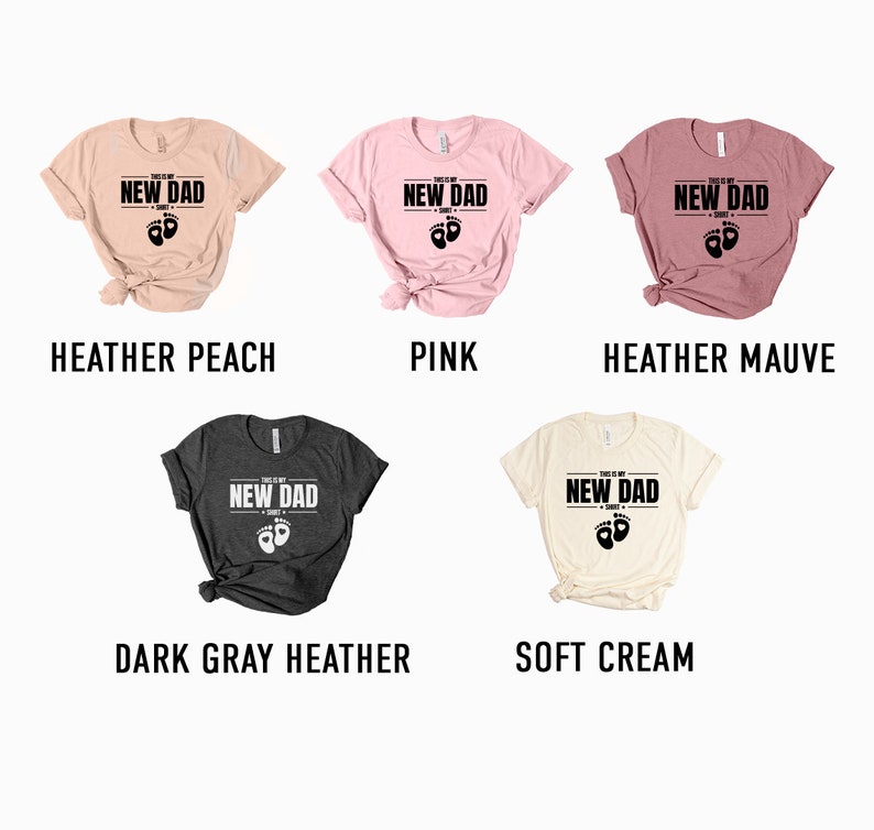 a group of t - shirts that say new dad, new dad, pink,
