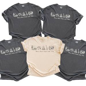 five t-shirts with a similar design, featuring icons of camping equipment and text that reads "Men's Camping Lodge Lake 2016".