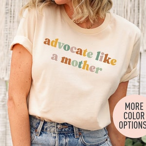 a woman wearing a t - shirt that says, adocate like a mother