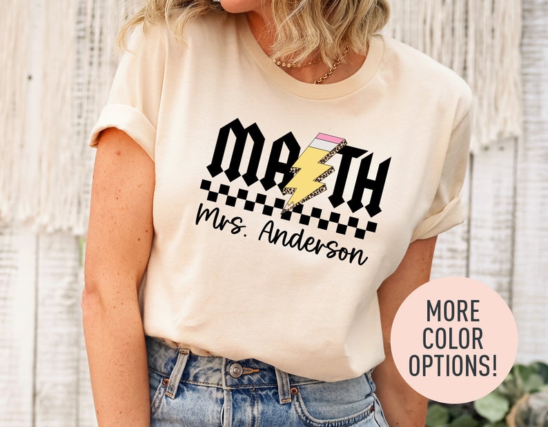 a woman wearing a t - shirt that says math is awesome