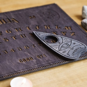 Ouija board from wood, classic spirit board Ouija, Occult practice, Spirit game for talking to the souls of the dead, Witchcraft decor