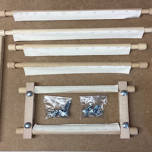 May include: A wooden embroidery hoop kit with four different sized hoops, two sets of screws, and two sets of wooden side pieces.