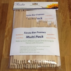 May include: A pack of Siesta Bar Frames Multi Pack, containing 27 different square and rectangular frames. The pack is made of clear plastic and shows the wooden frames inside. The pack is labelled with the brand name, product name, and instructions for use.