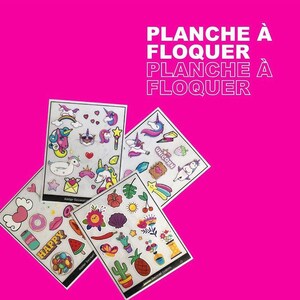 May include: Four sheets of colorful iron-on transfer designs featuring unicorns, rainbows, hearts, and other whimsical elements. The sheets are labeled "Atelier Souvenirs" and "Atelier Clement Custom".