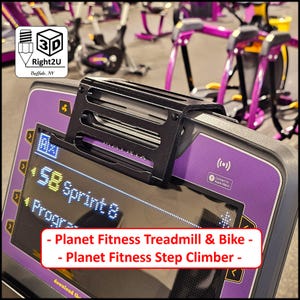 May include: Black phone holder attached to a purple and black Matrix treadmill console. The screen displays workout data. Text on the screen reads "58 Sprint 8". The holder is designed for Planet Fitness treadmills, bikes, and step climbers.