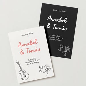 May include: Two save the date cards with black and white text. The top card has a white background and the text "Save Our Date" in black. The text "Annabel & Tomás" is in red. The bottom card has a black background and the text "Save Our Date" in white. The text "Annabel & Tomás" is in white. Both cards have the date "Saturday October 5, 2027" and the location "Austin, Texas". The top card has a drawing of a guitar and a glass of wine. The bottom card has a drawing of two glasses of wine.