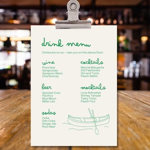 May include: A green and white drink menu with the title "drink menu" and a list of drinks including wine, beer, cocktails, mocktails, and sodas. The menu also includes the text "Drinks are on us - see you on the dance floor!" and a green line drawing of a canoe.
