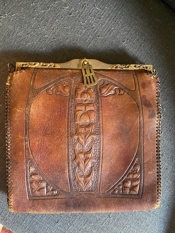 1918 Art nouveau tooled leather purse