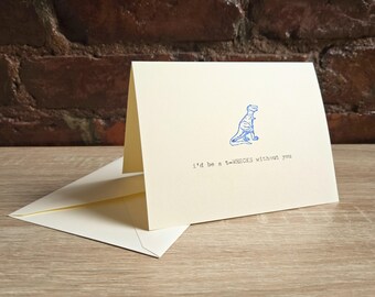 May include: A light yellow card with a blue dinosaur illustration and the text "I'd be a T-Rex without you".