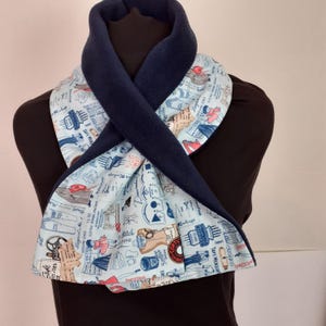 Keyhole Fleece Scarf, Light blue cotton fabric lined with navy non pill fleece. Dressmaking print fabric Length 39&quot; x Width 7&quot;