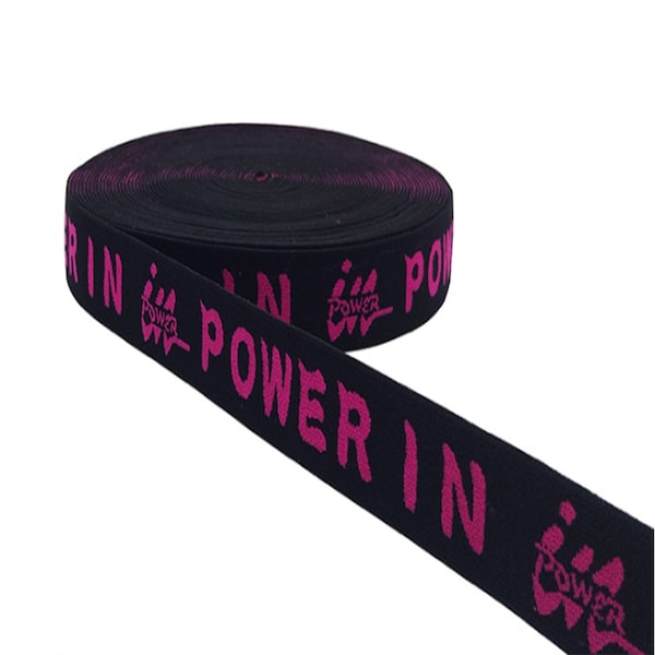 Stylishly designed jacquard elastic bands with customized logos and letters for unique customized apparel items.