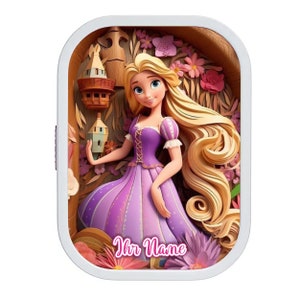 May include: A white lunchbox with a colorful image of Rapunzel from the Disney movie Tangled. The image shows Rapunzel in a purple dress with her long blonde hair. The lunchbox has the text "Ihr Name" on the bottom.