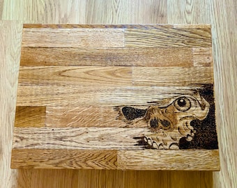 Large solid oak chopping board with skull