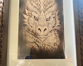 Pyrography hand engraved dragon on plywood in frame.