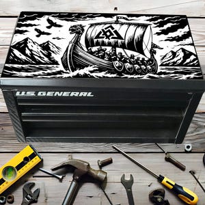 May include: A set of three ceramic nesting bowls in shades of blue, green, and white. The bowls feature a speckled glaze and a simple, modern design. The largest bowl is approximately 7 inches in diameter.