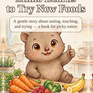 May include: A children's book titled Mimo Learns to Try New Foods by Hannah Martin. The cover features a brown bear cub giving a thumbs up, surrounded by carrots, raspberries, broccoli, and bananas on a wooden table in a kitchen setting.