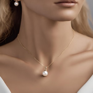 Süßwasserperle Anhänger in 375er 9 Karat Gelbgold - Zeitlose Eleganz - Das perfekte Valentinstag Geschenk für sie Anhänger mit Perle 6 mm