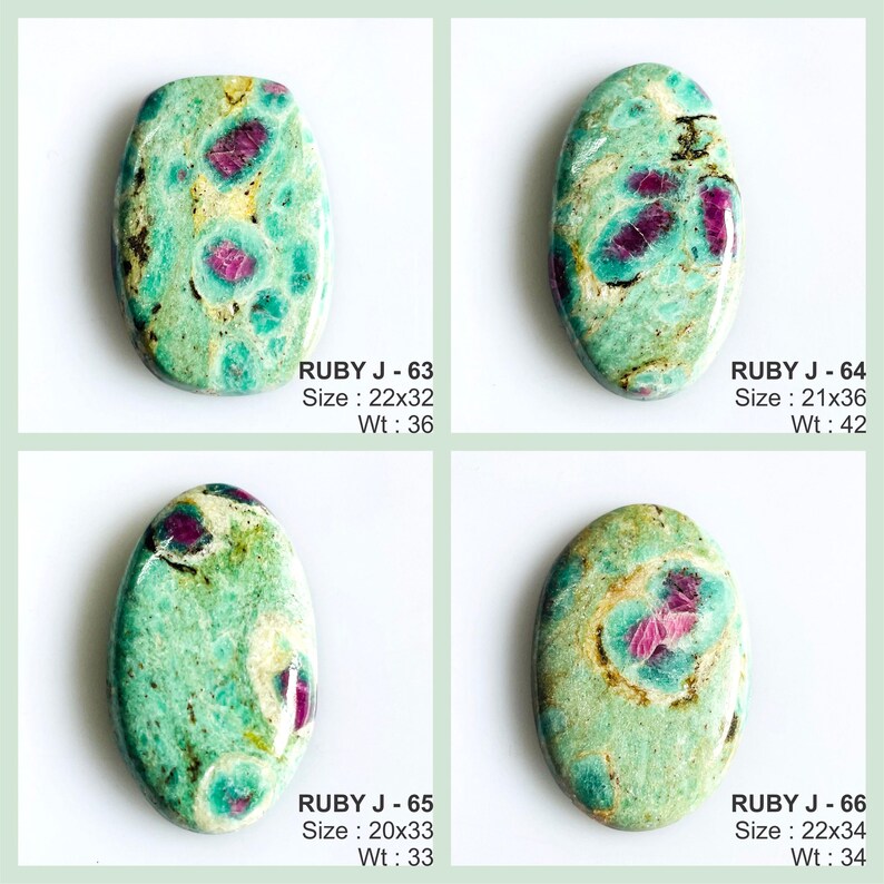 May include: Four oval-shaped polished gemstones featuring a mottled mint green and teal matrix with embedded deep magenta ruby inclusions. Each stone is labelled with text including RUBY J-63, 64, 65, 66, along with dimensions in mm and weight in carats.